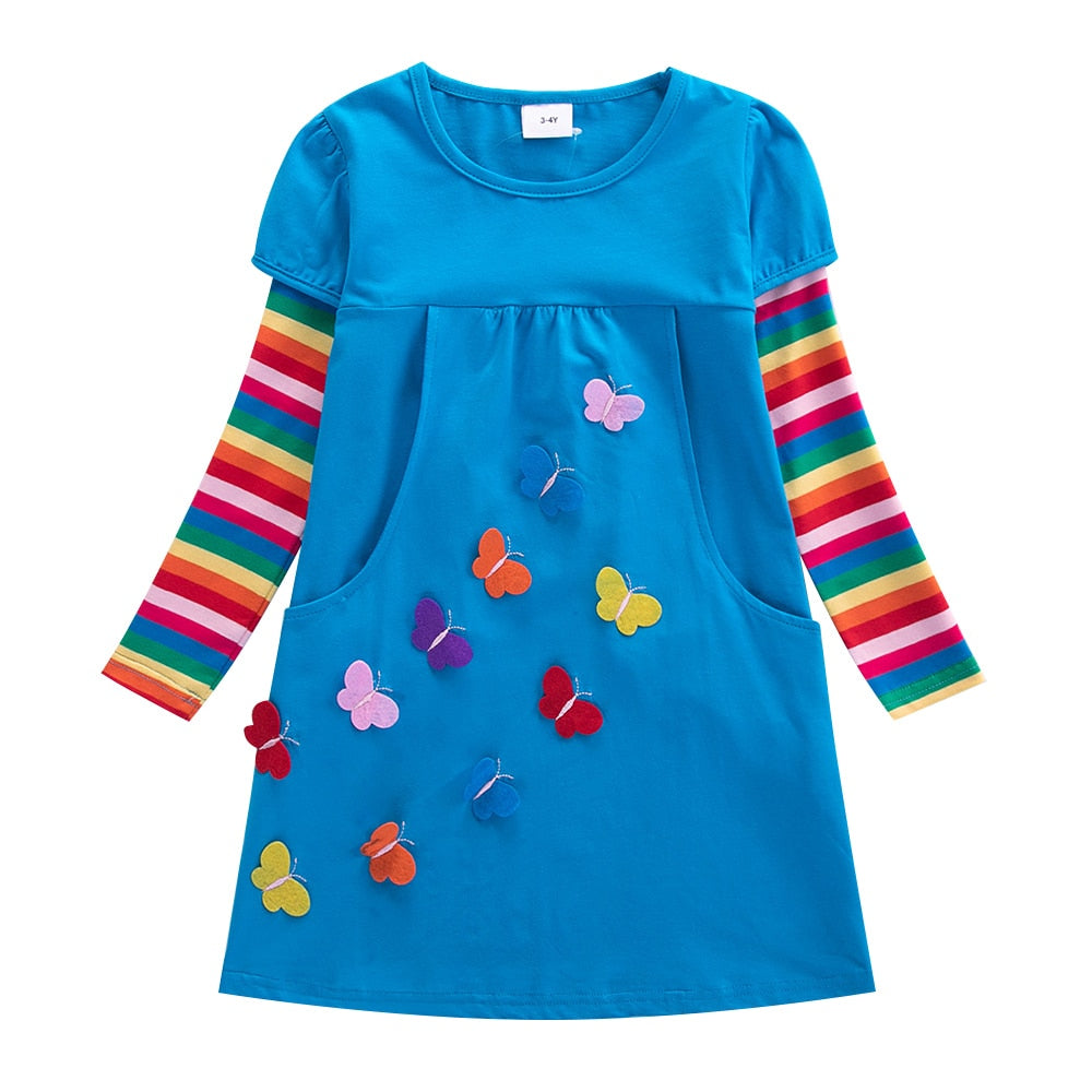 Close-up of Girls' Butterfly & Stripes Long Sleeve Knit Dress fabric, showing detailed butterfly prints