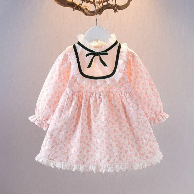 Stylish baby girl's candy striped cotton dress and matching bow headband for summer