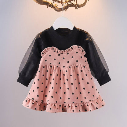 Full view of a girls' candy striped summer dress with a coordinating pink headband
