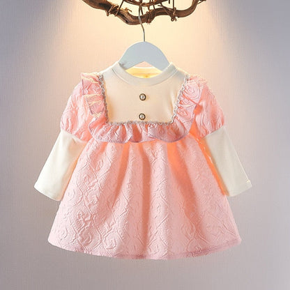 Back view of a girls' candy striped summer dress, showcasing comfortable design
