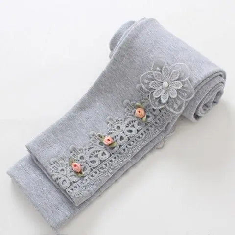 Durable girls' cartoon print skinny pants, designed for lasting comfort and style.