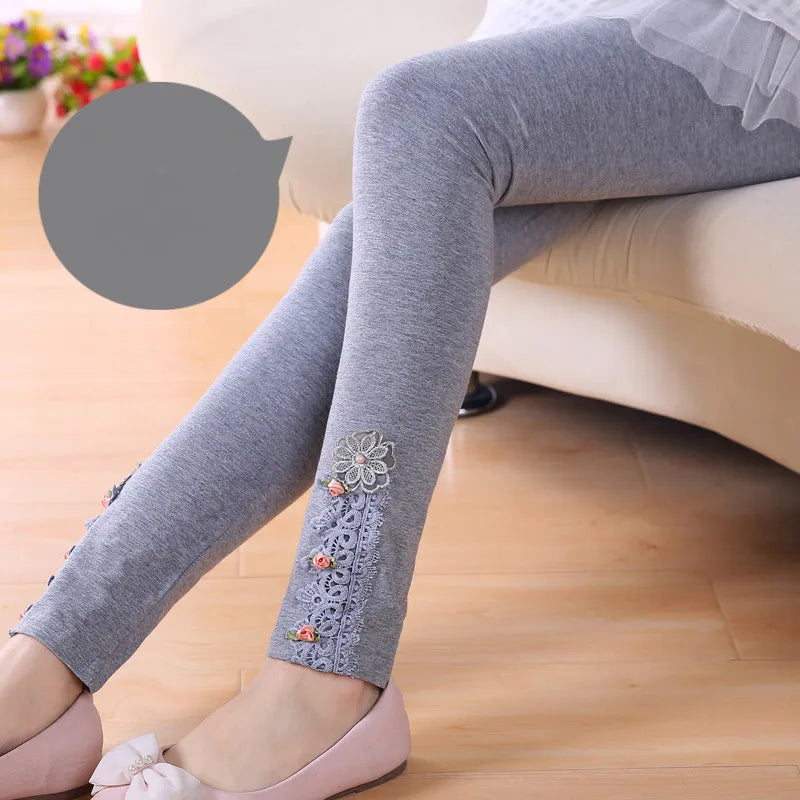 Stylish girls' apparel: skinny leggings with popular cartoon characters, great for school.