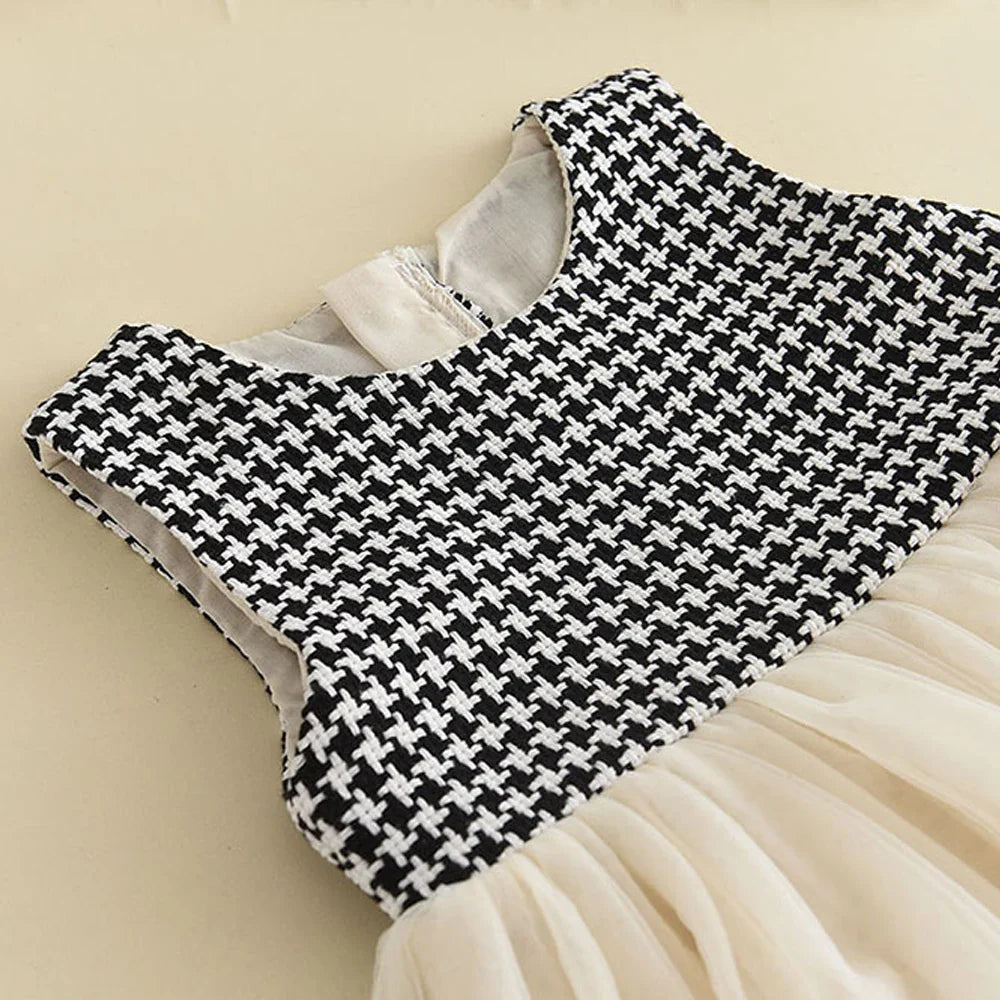 Kids' fashion: an adorable checkered dress and a sophisticated retro coat set