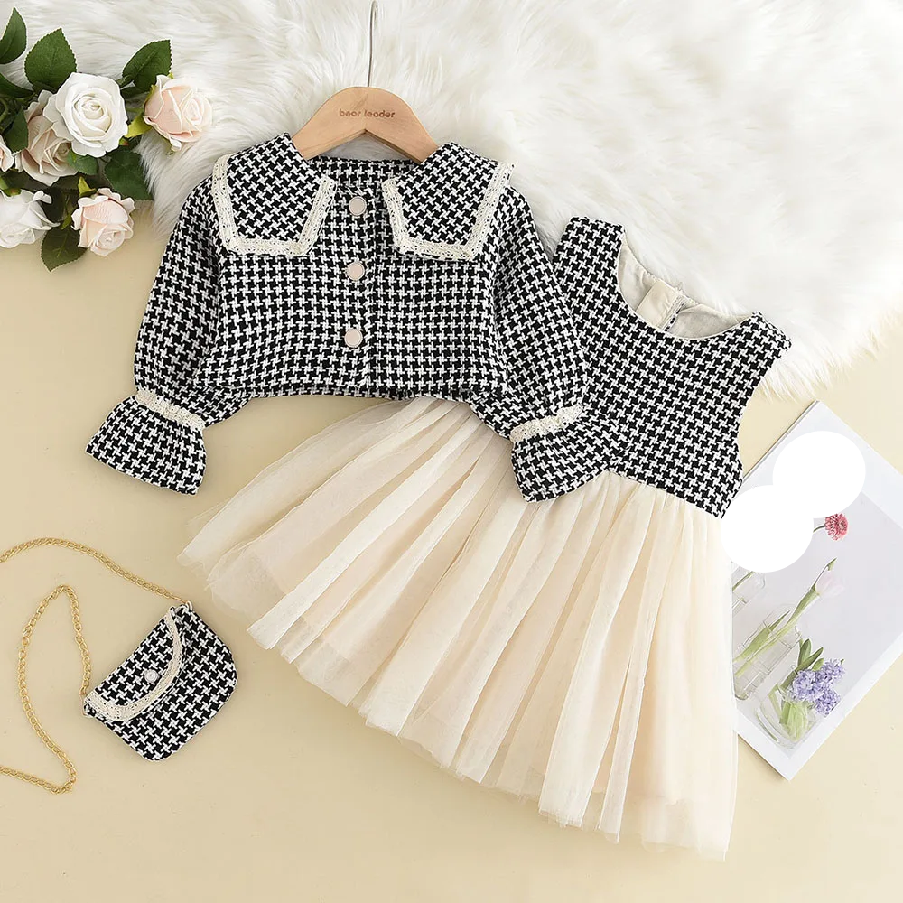 Detail of the retro coat's collar and texture, a perfect layering piece for kids