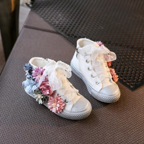 Girls' chic floral mid-cut canvas sneakers with zipper closure. Perfect for casual wear & kids fashion.