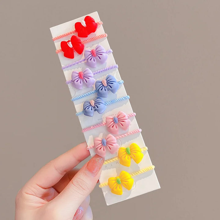 Toddler flower hair bands, gentle elastic ties to keep little girls' hair neat and stylish.