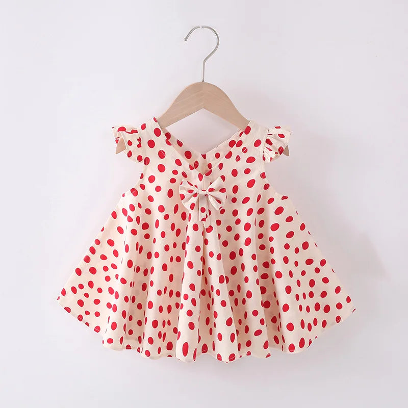 Girls' casual cotton summer dress featuring an all-over floral print design, A-line silhouette.