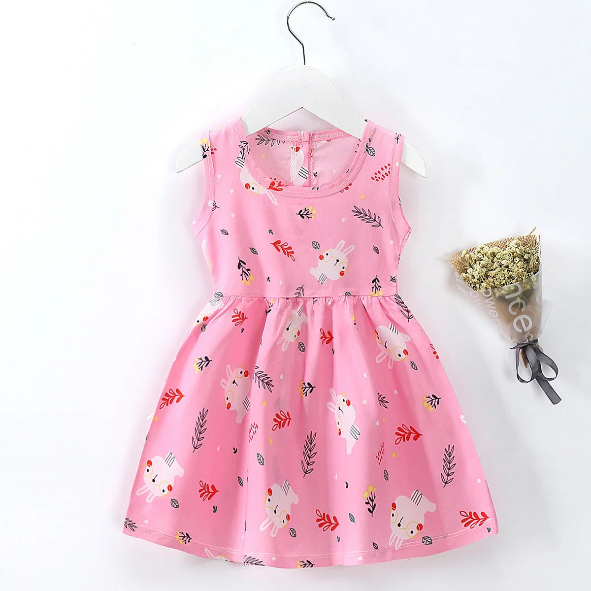 Toddler girl's pink floral sleeveless cotton dress, perfect casual summer outfit, knee-length.