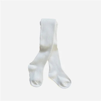 Girls' elegant navy cotton knitted tights, offering both warmth and a classic look for children's fashion.