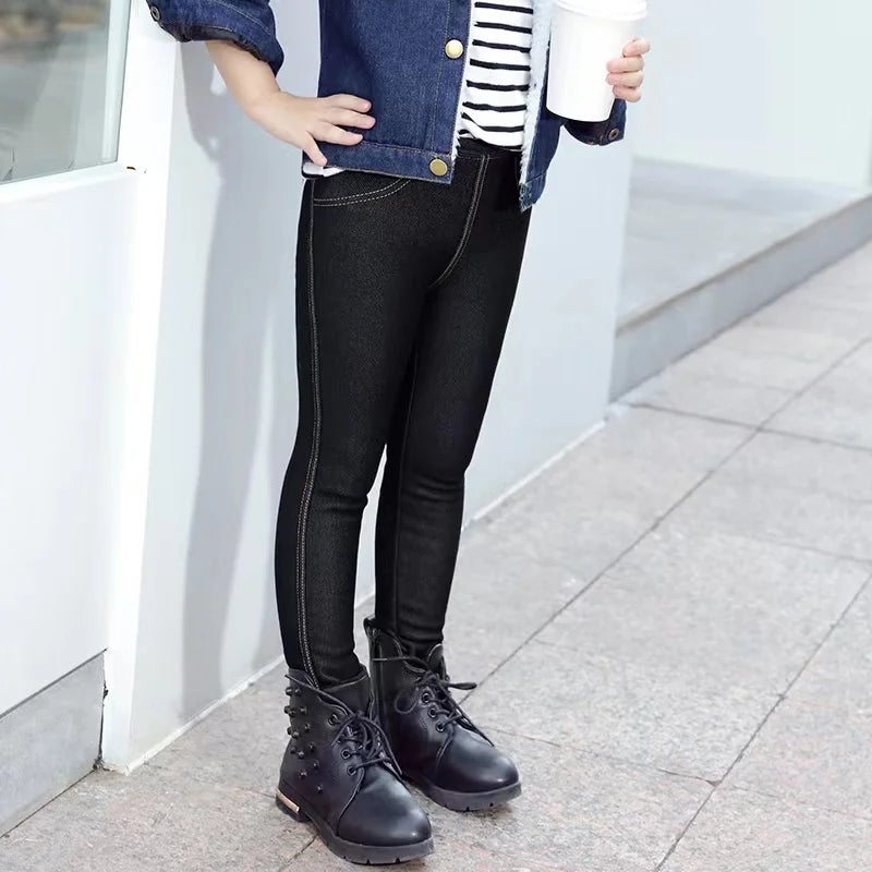 Girls' cozy winter denim leggings, warm & stylish for cold weather play & everyday wear. Elastic waist pants.