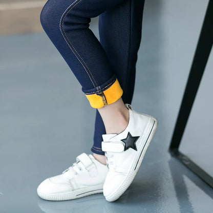 Girls' fuzzy-lined denim leggings, warm & cozy for winter. Stylish children's apparel, everyday wear pants.