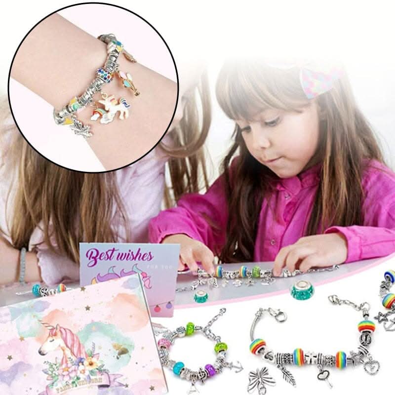 Sparkling charms & colorful beads from a girls' jewelry making kit, ideal for creative DIY projects.