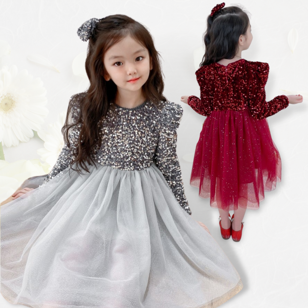 Back view of a girls' elegant white sequin long sleeve princess dress with a bow detail, special occasion.