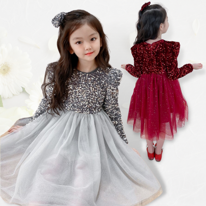 Back view of a girls' elegant white sequin long sleeve princess dress with a bow detail, special occasion.