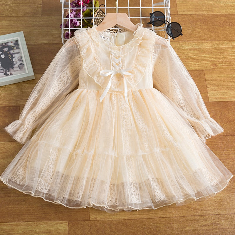 Girls' long sleeve sequin princess dress in vibrant red, styled for a festive holiday party or birthday.