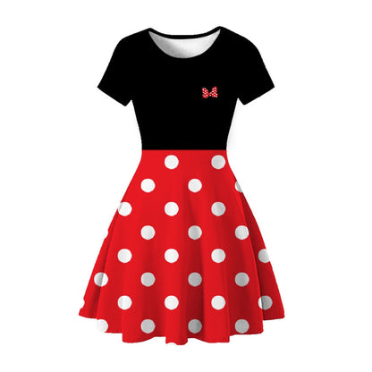 Full shot of a girls' denim dress with a vibrant floral pattern, suitable for summer outfits