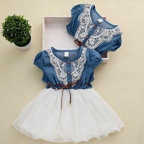 Kids' fashion denim dress for girls, adorned with delicate tulle stitching and charming embroidered chest detail.