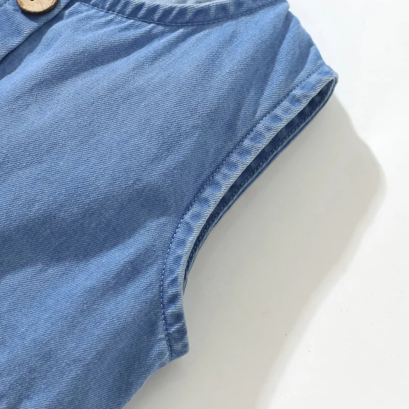 Back view of a girls' denim unicorn A-line dress, highlighting the comfortable sleeveless design.
