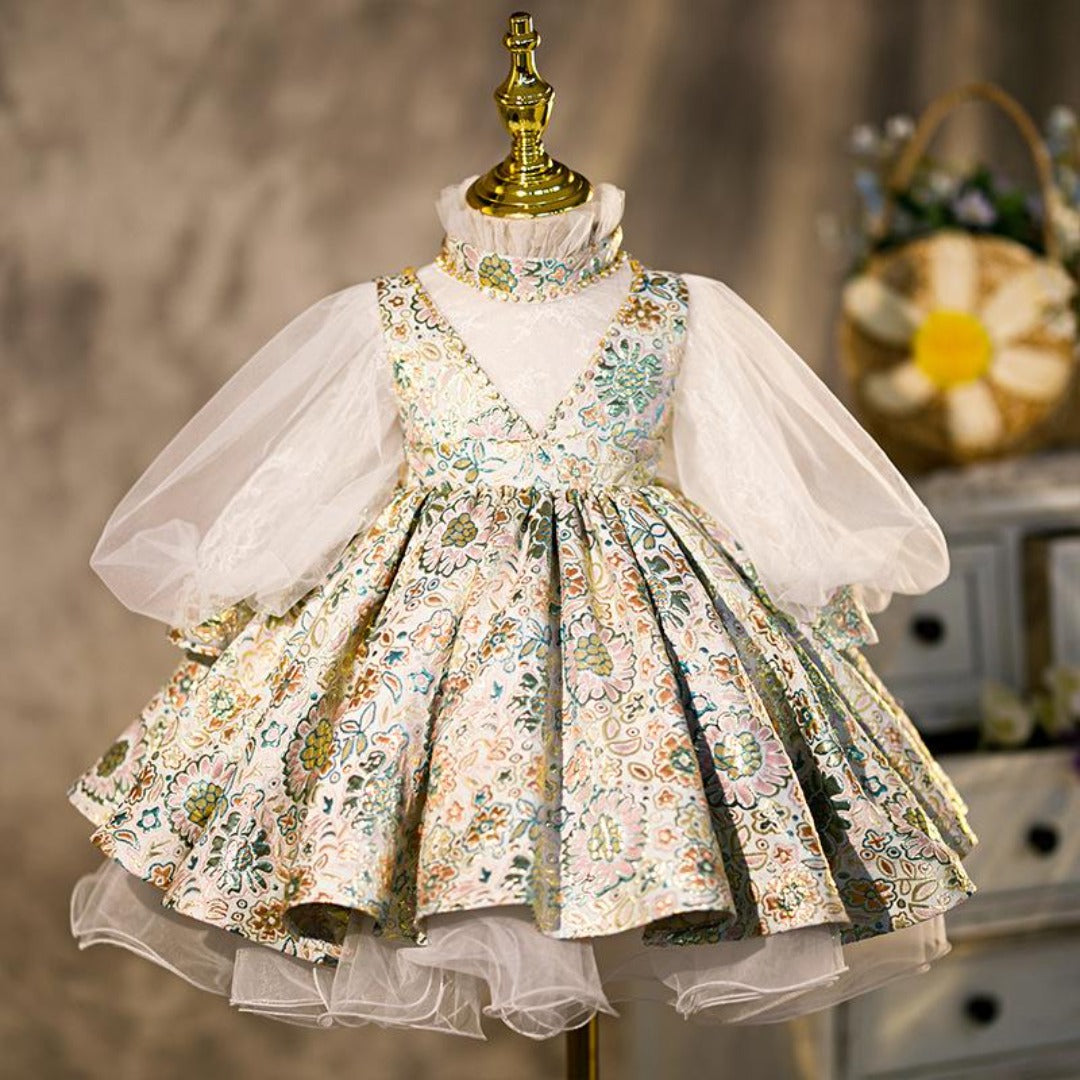 Toddler girl wearing a beautiful white lace floral princess ball gown dress with full skirt