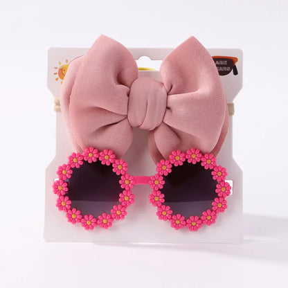 Trendy girls' accessory set: chic sunglasses and a playful bow headband in vibrant colors