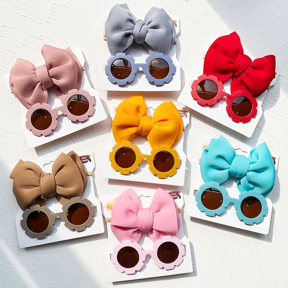 Fashionable girls' sunglasses with unique frame details and a coordinating bow headband