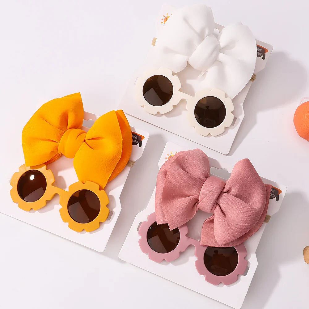 High-quality girls' sunglasses for eye protection and a soft, decorative bow headband