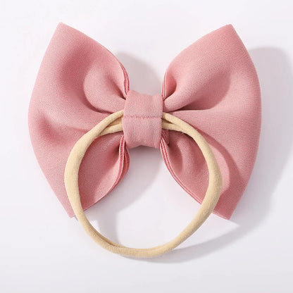 Complete kids' summer look: girls' cool sunglasses and a cute fabric bow headband