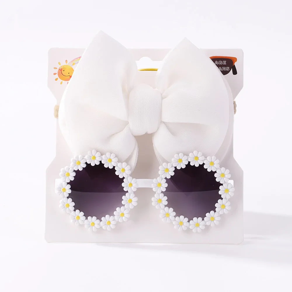 Stylish girls' accessory set featuring trendy sunglasses and a patterned bow headband