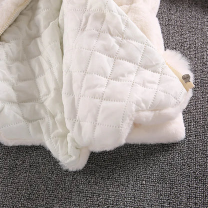 Studio shot of a girls' white faux fur winter princess jacket, clear detail, baby clothing