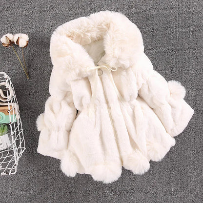 Back view of girls' white faux fur winter princess jacket with hood, warm toddler coat