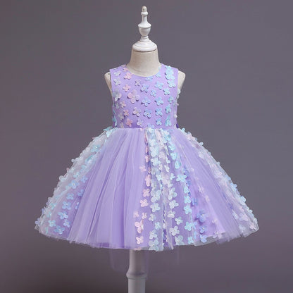 Close-up of the lace and embroidered patterns on a girls' floral princess party dress