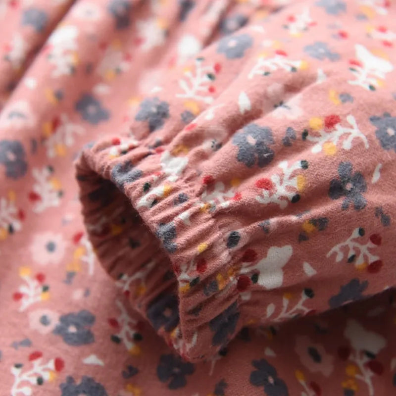 Playful girls floral princess dress with long sleeves, ideal for casual spring and autumn adventures.