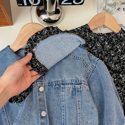 Back view of girls' denim jacket with functional buttons, a staple for kids fashion. Two-piece set.