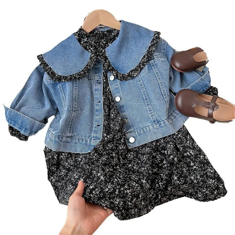 Detail of girl's floral dress fabric, showing high-quality print and delicate colors for toddler wear.
