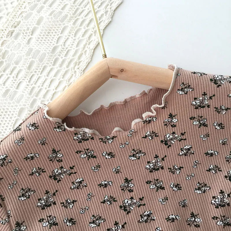 Girls' polyester floral print pajama shorts and matching top, perfect for summer nights