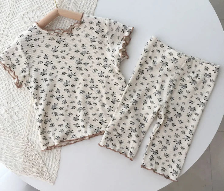 Girls' cute floral print sleepwear set with elastic waist shorts, comfy and stylish