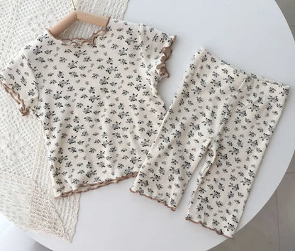 Girls' cute floral print sleepwear set with elastic waist shorts, comfy and stylish