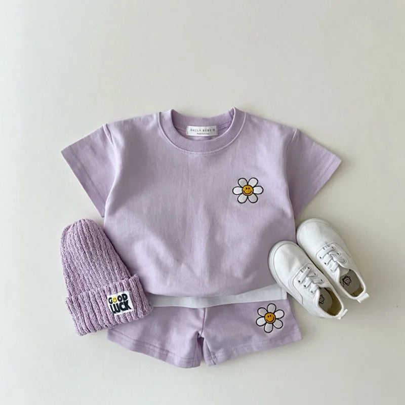 Girls' floral summer top and cotton shorts set for toddlers, perfect for playwear