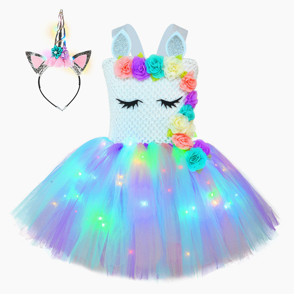 Close-up of a girls' unicorn LED tutu dress, showcasing the intricate floral details and lights.