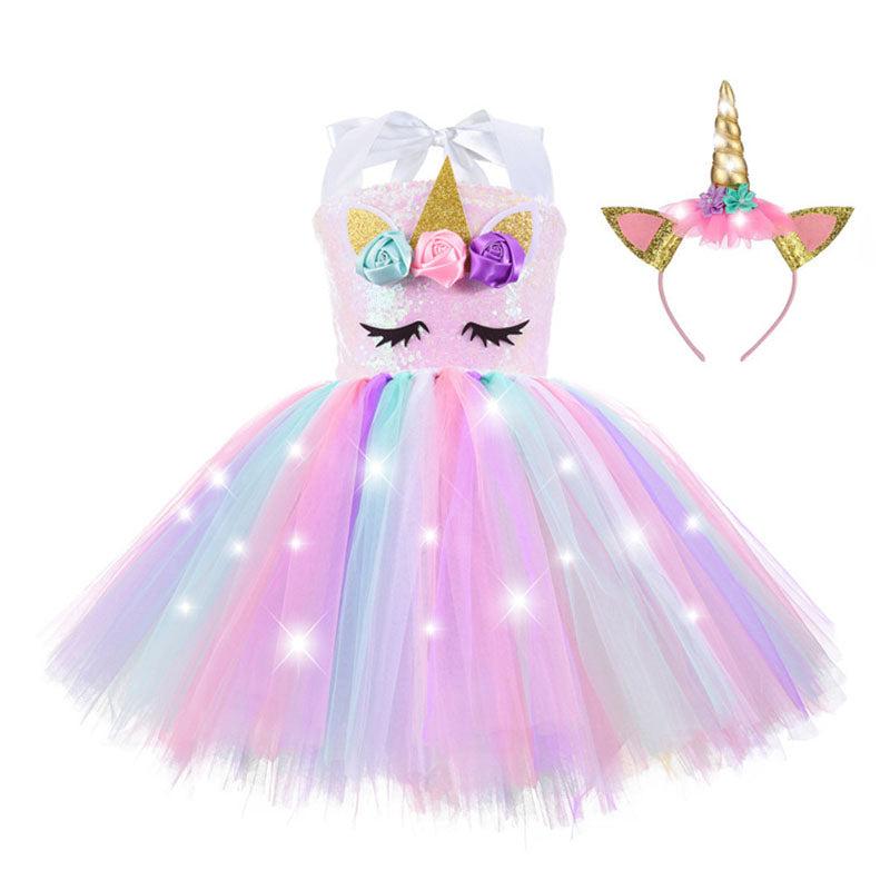 Full-length view of a fantasy girls' LED tutu dress with a unicorn theme and crochet bodice.