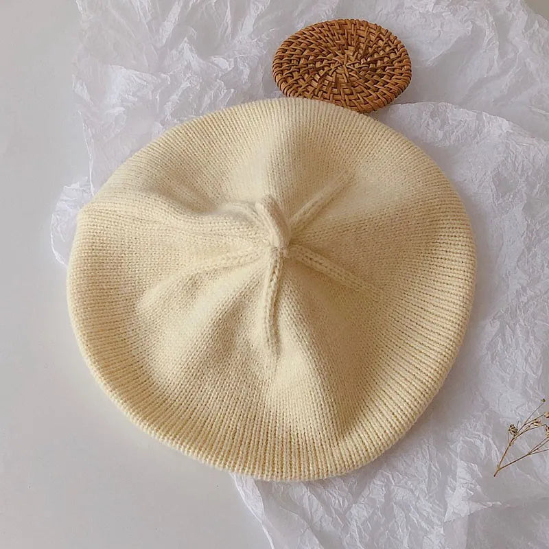 Baby girl's winter knit beret, French style with a cute bow, warm and stylish
