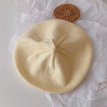 Baby girl's winter knit beret, French style with a cute bow, warm and stylish