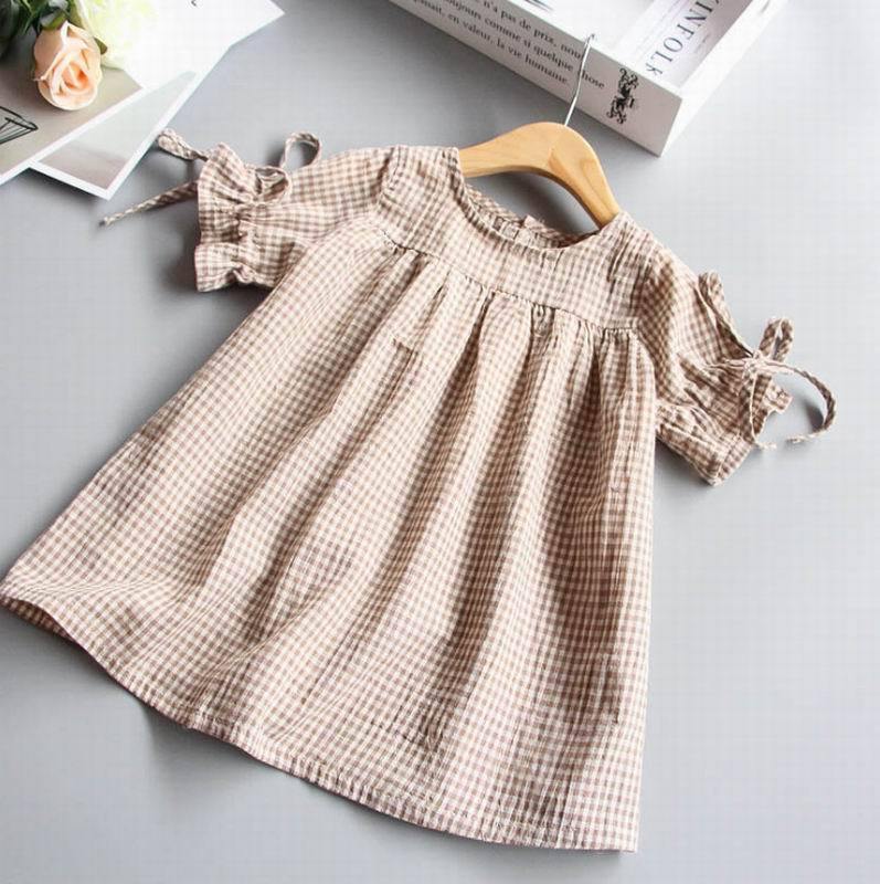 Girls' gingham play dress, comfortable cotton frock for toddlers. Stylish summer outfit for baby girls.