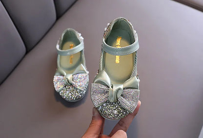 Fashionable girls' pink princess shoes with an eye-catching rhinestone bow, dressy footwear