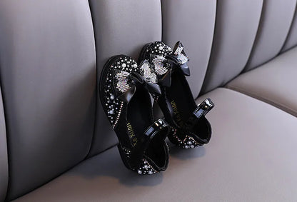 Girls' pink flats with a glitter finish and beautiful rhinestone bow, ultimate princess shoes