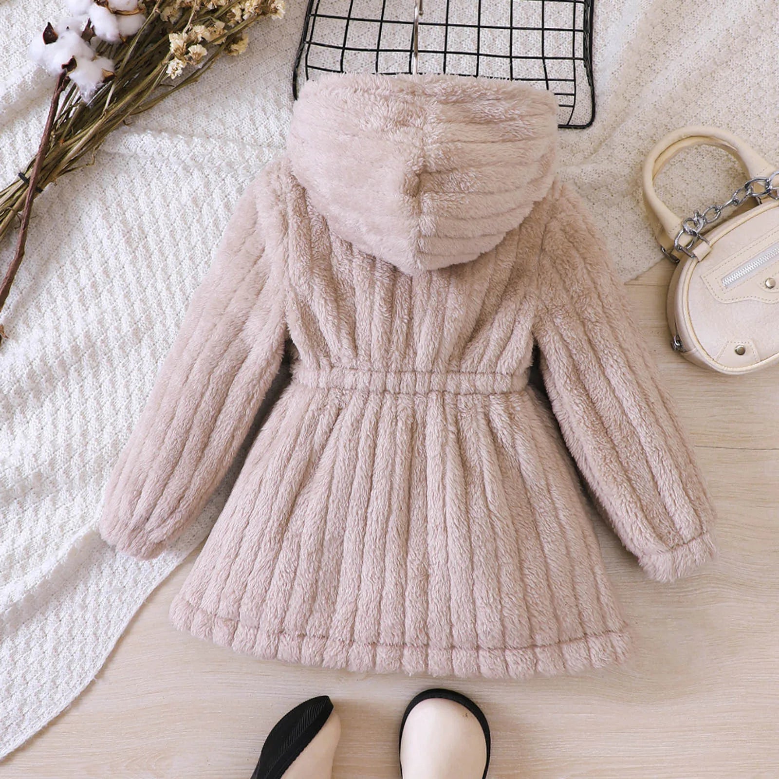 Toddler girl wearing khaki fleece-lined winter coat, embroidered detail, kids fashion, warm jacket