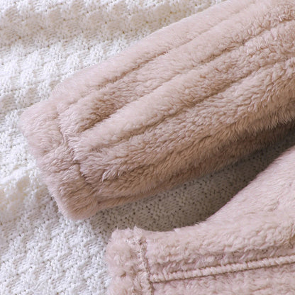 Back view of embroidered girls' khaki winter coat, fleece-lined, perfect for cold weather
