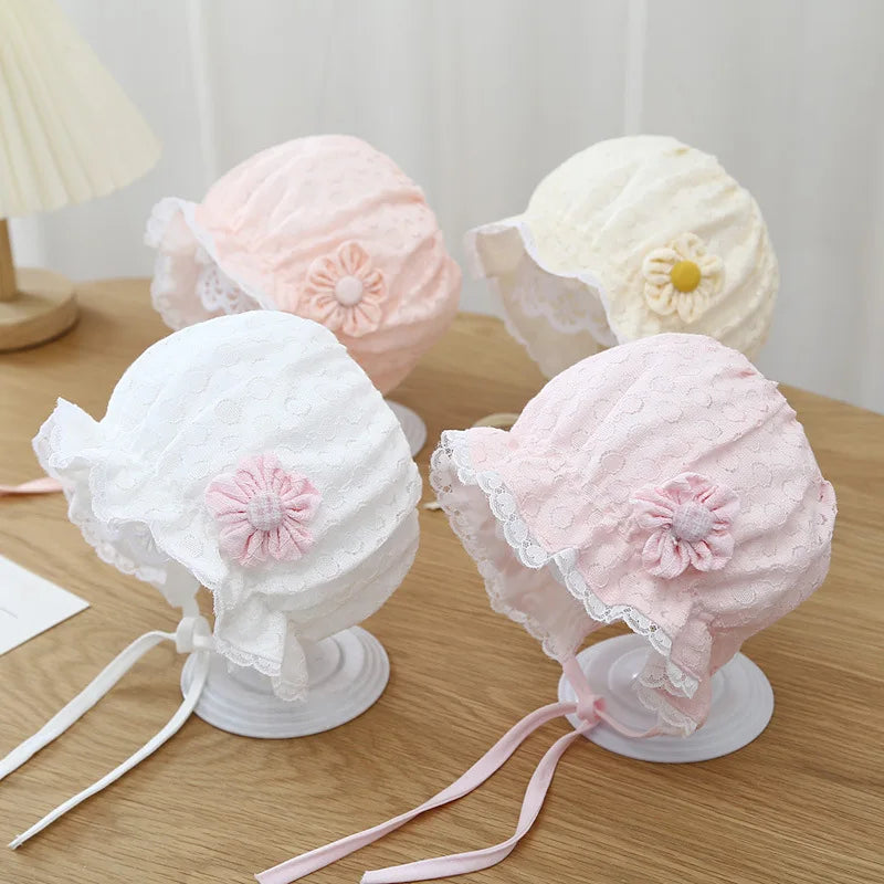 Newborn baby bonnet, white lace and ruffle details, perfect for summer fashion
