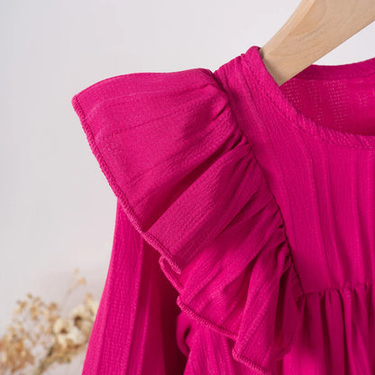 Girls' long sleeve ruffle dress, princess style, paired with cute shoes for a complete look.