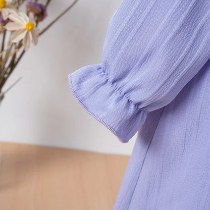 Girls' long sleeve ruffled princess dress in a bright color, making a statement for spring.